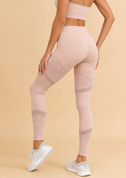 Legginsy sportowe z ażurowymi wstawkami