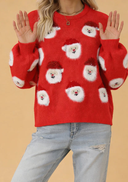 Świąteczny sweter z motywem Mikołajów