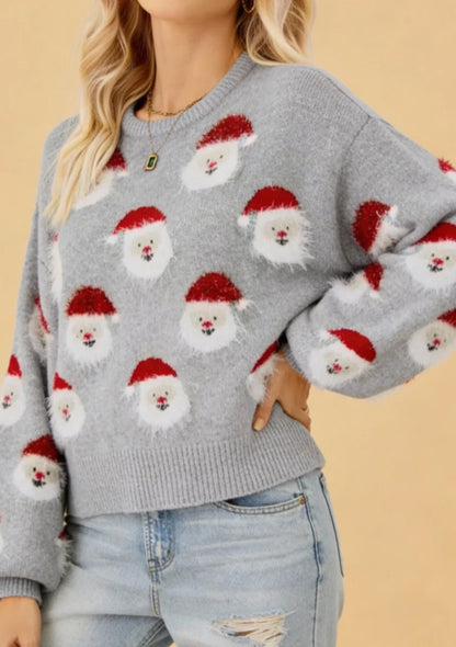 Świąteczny sweter z motywem Mikołajów